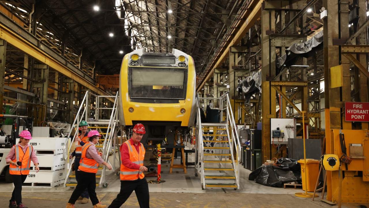 Manufacturing company Downer Group warns staff of potential job cuts as it prepares to build trains for Brisbane Olympics