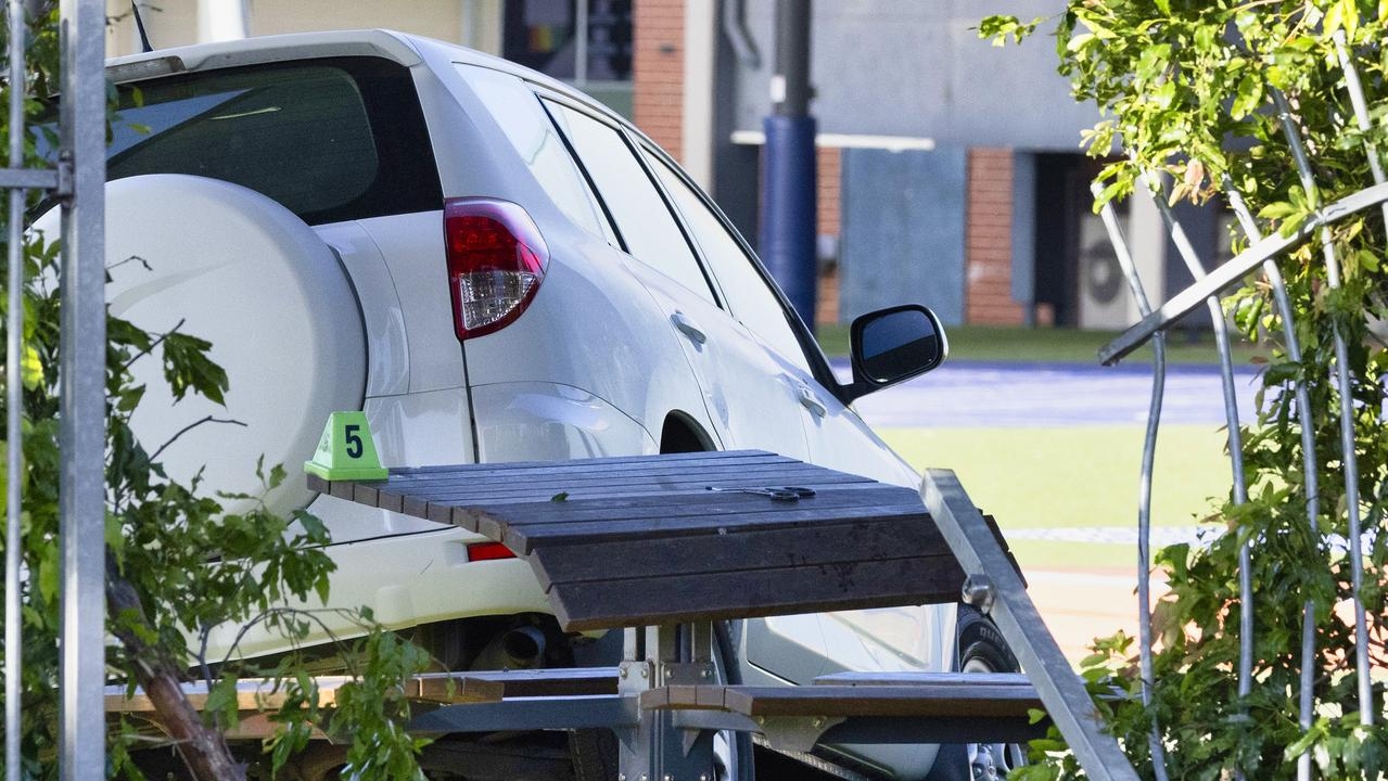 Woman charged after car crashed into a Melbourne primary school, killing a boy