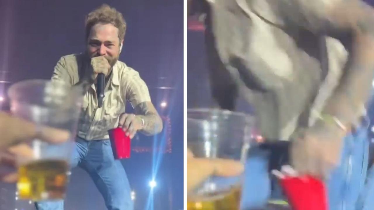 ‘Didn't mean to almost break your back': Fans scream as Post Malone falls off stage