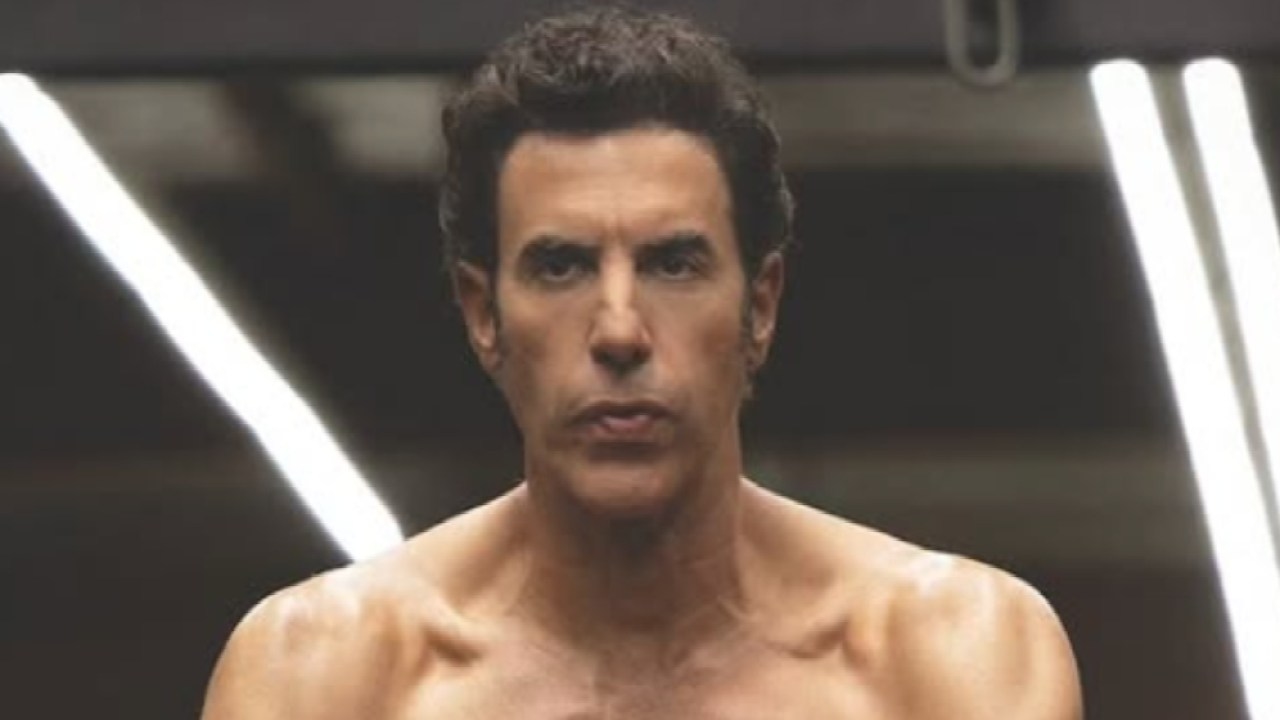 'Hard launching my mid-life crisis': Sacha Baron Cohen stuns fans with shredded new physique at 53 after finalising $250 million divorce from Aussie actress Isla Fisher