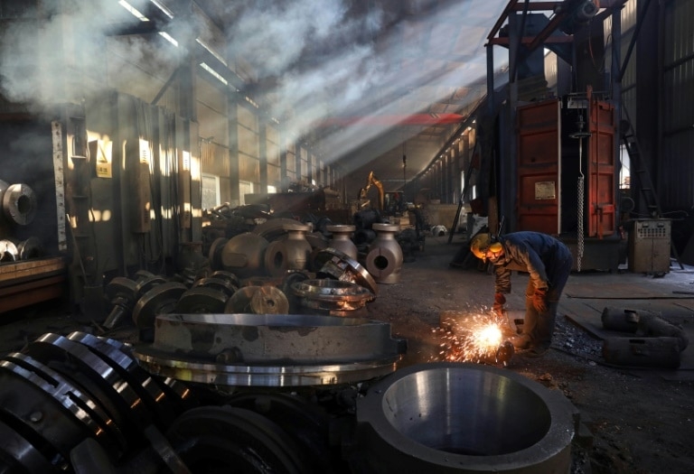 China exports slow as trade war takes toll