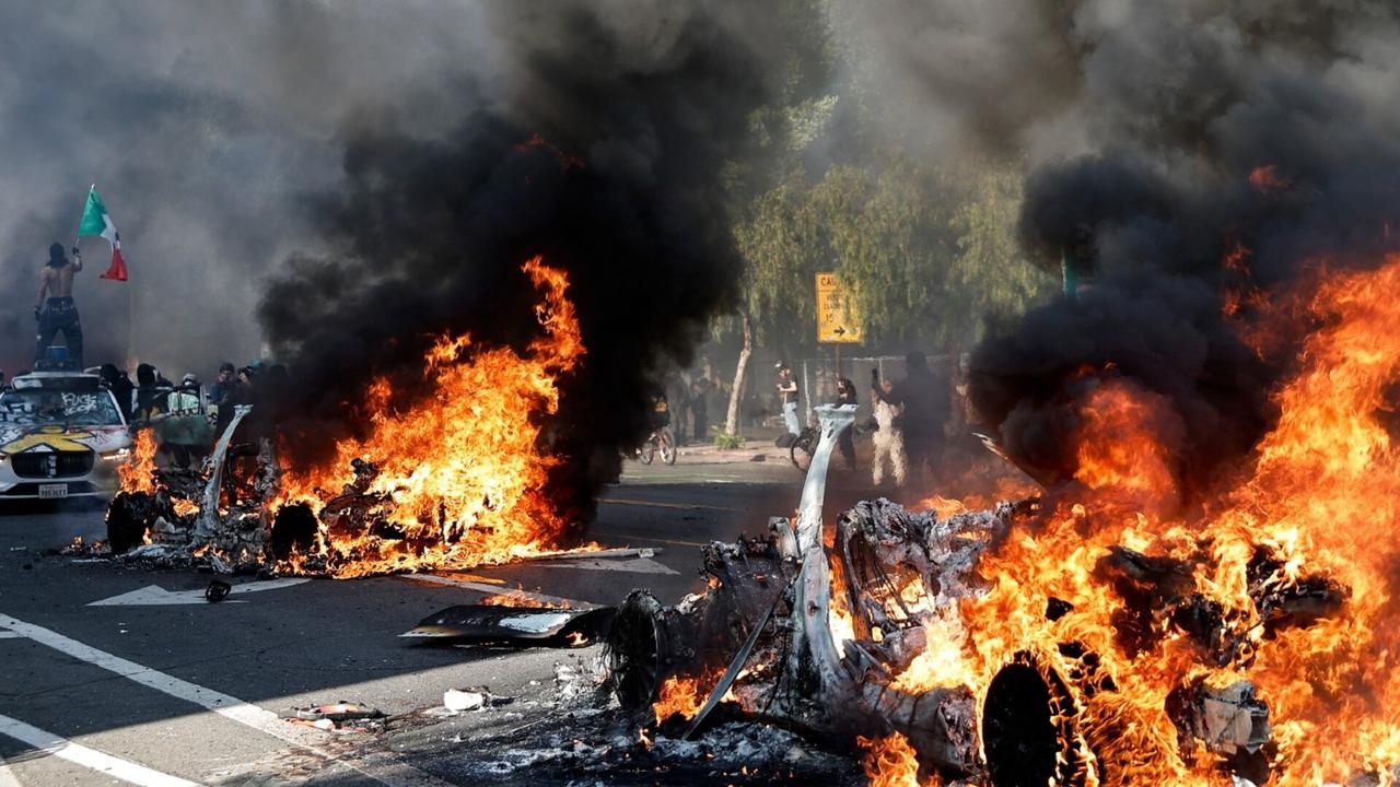 Businesses looted and cars set ablaze in LA anti-ICE riots