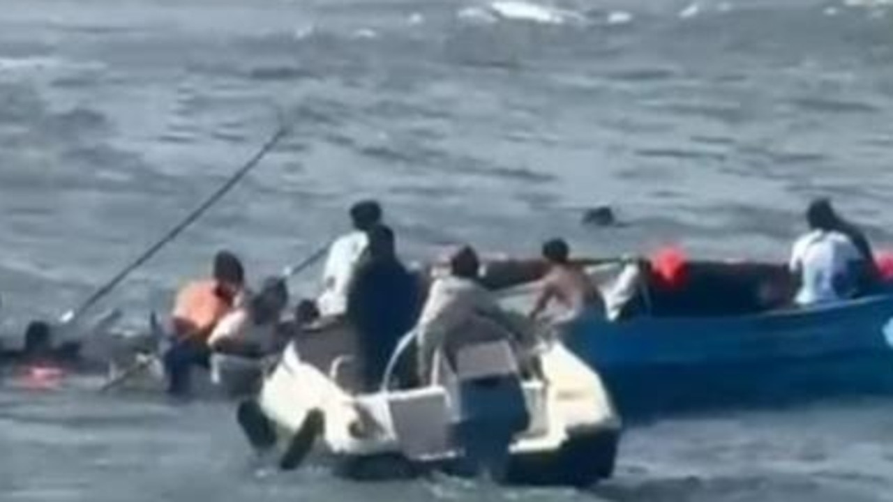 Two dead, five Australians injured after tourist boat capsizes in Bali