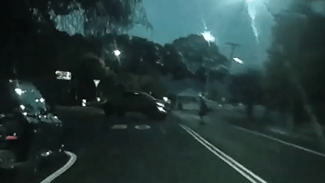 Man, 20, charged after allegedly hitting woman crossing the road with a ute in Penrith and fleeing the scene