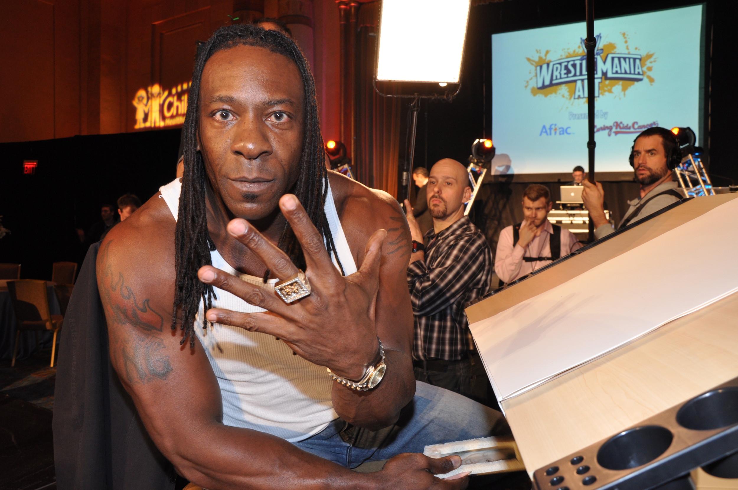 Wrestling Legend Booker T Reacts to Major WWE, AEW Feud