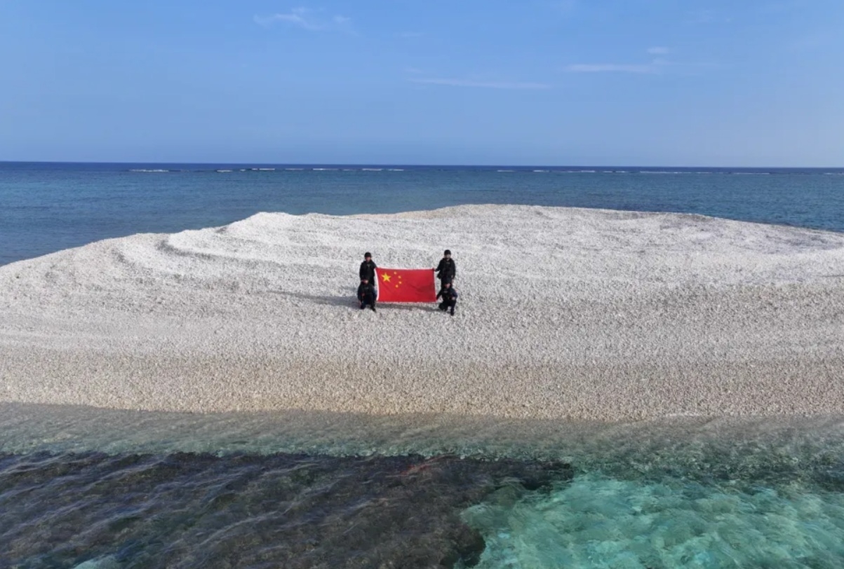 China Plants Flag on Disputed South China Sea Territory