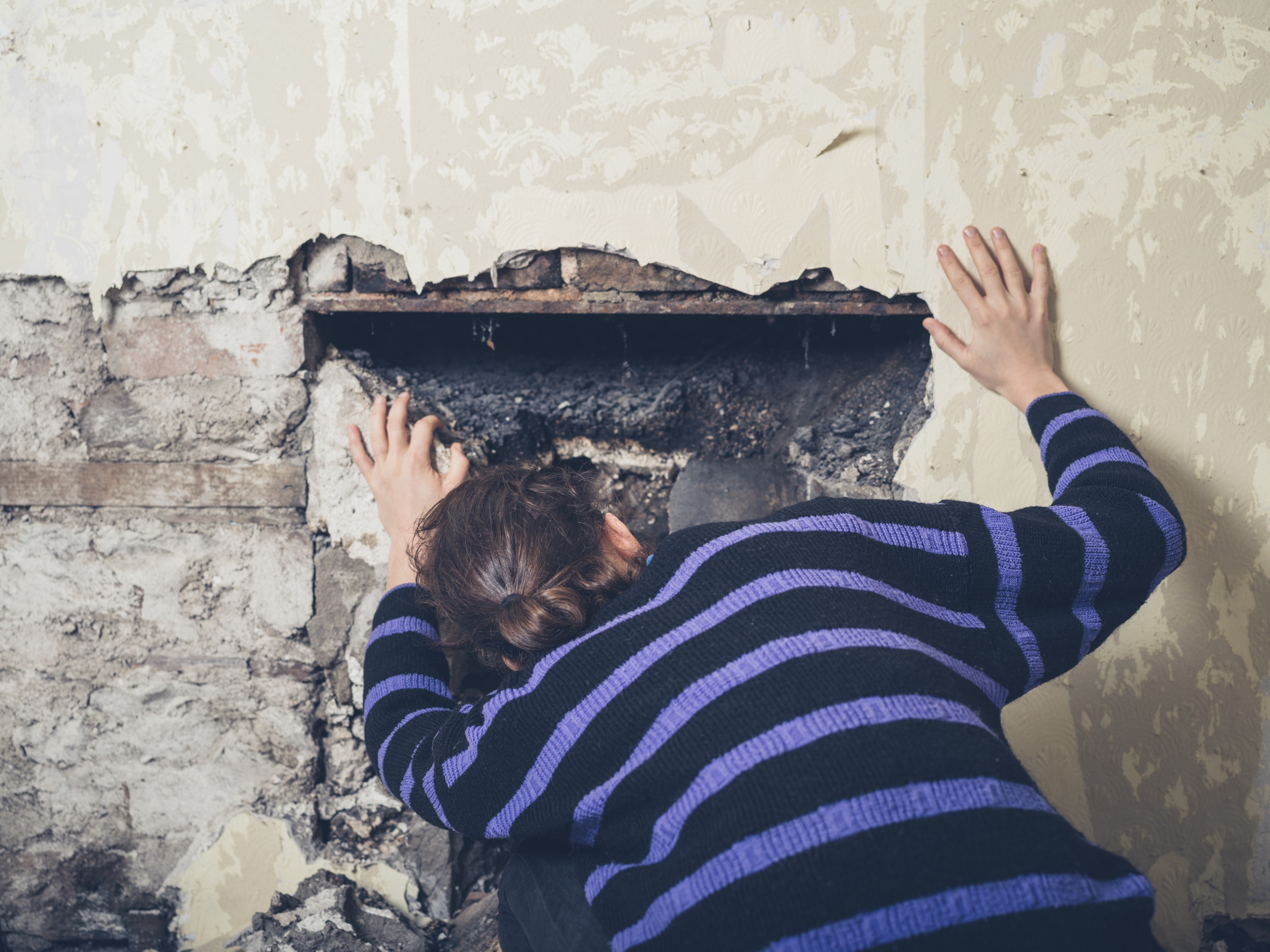 Homeowner Decides To Rip Out Wall—Discovers Secret Note Hidden for Decades