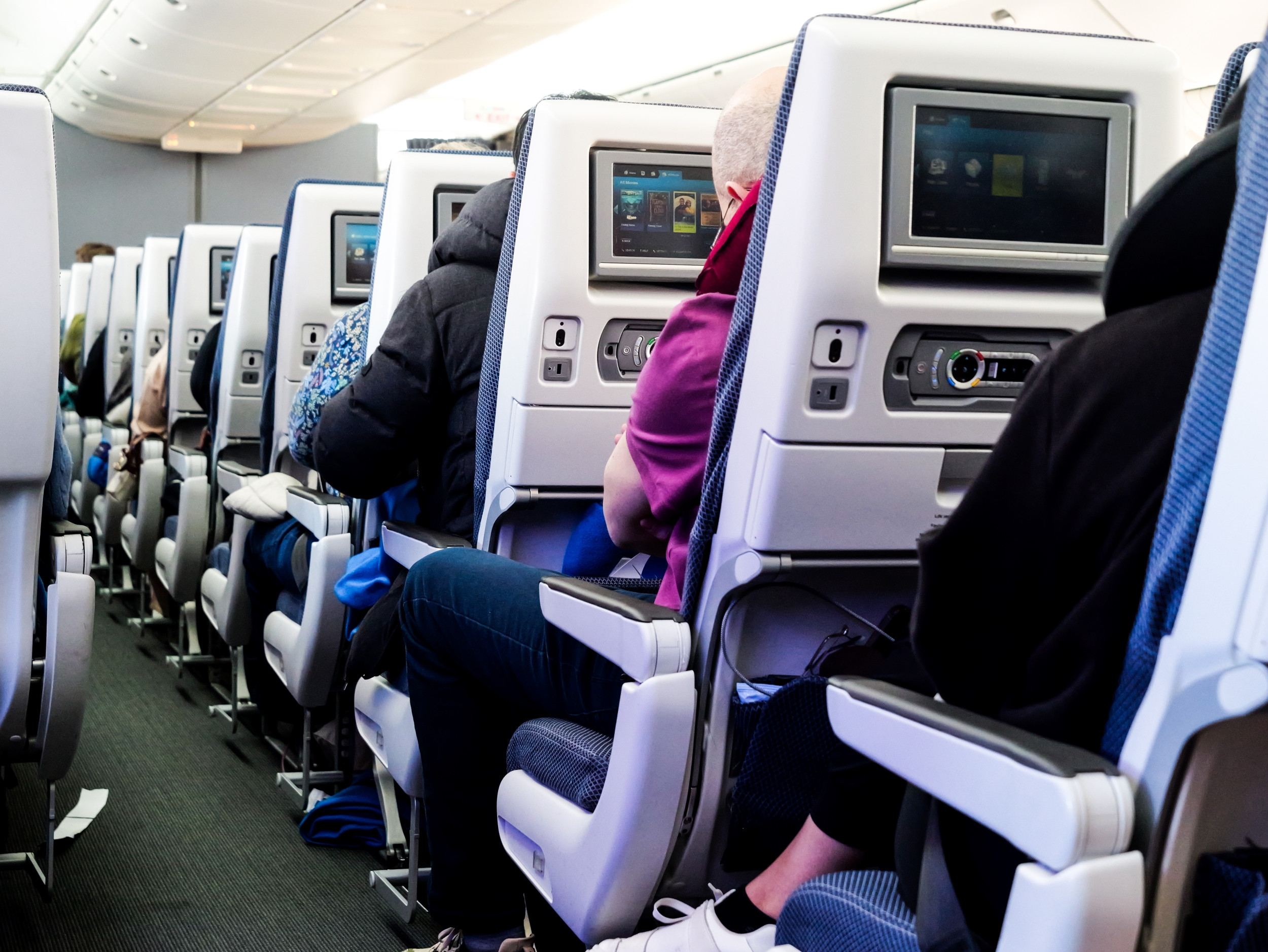 Plane Passenger's Take on Reclining Seats Goes Viral—Sparks Debate