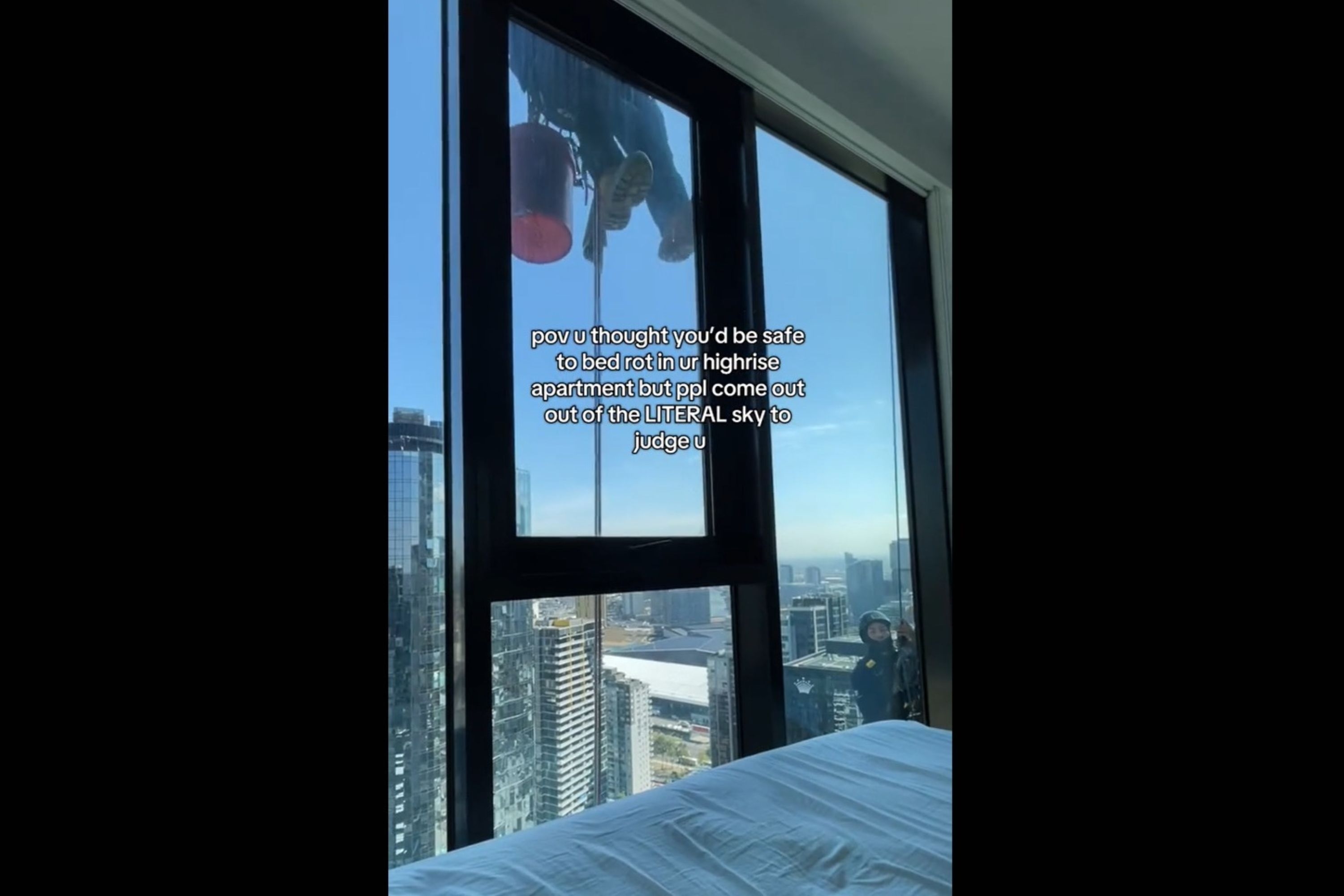Woman Relaxes in High-Rise Bedroom—Then Sees Someone at the Window