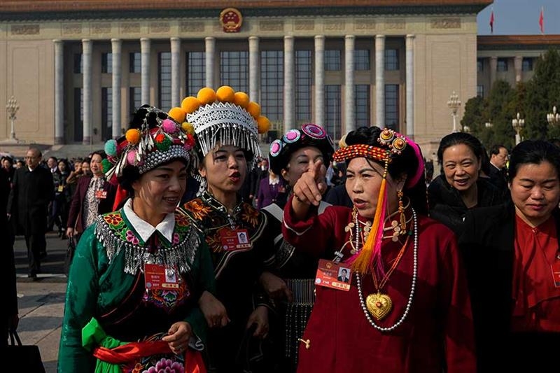 China's annual political meetings feature minority delegates in tribal finery with a message - International
