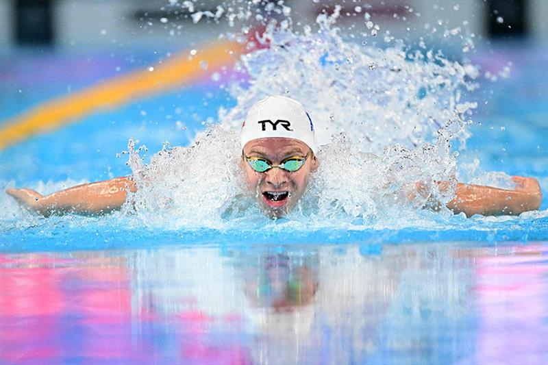 Swimming: Marchand smashes long-standing 200m medley world record - Omni sports