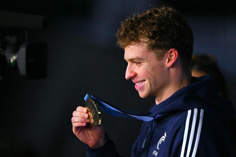 Swimming: Magic Marchand adds gold to world record as McIntosh wins again - Omni sports