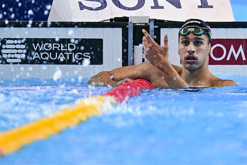 Swimming: Tunisia's Jaouadi pushes through pain for second world gold - Omni sports