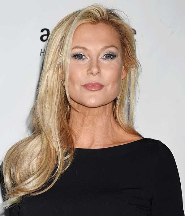 Bond girl Alison Doody reunites with a View to a Kill co-star to mark 30 year anniversary