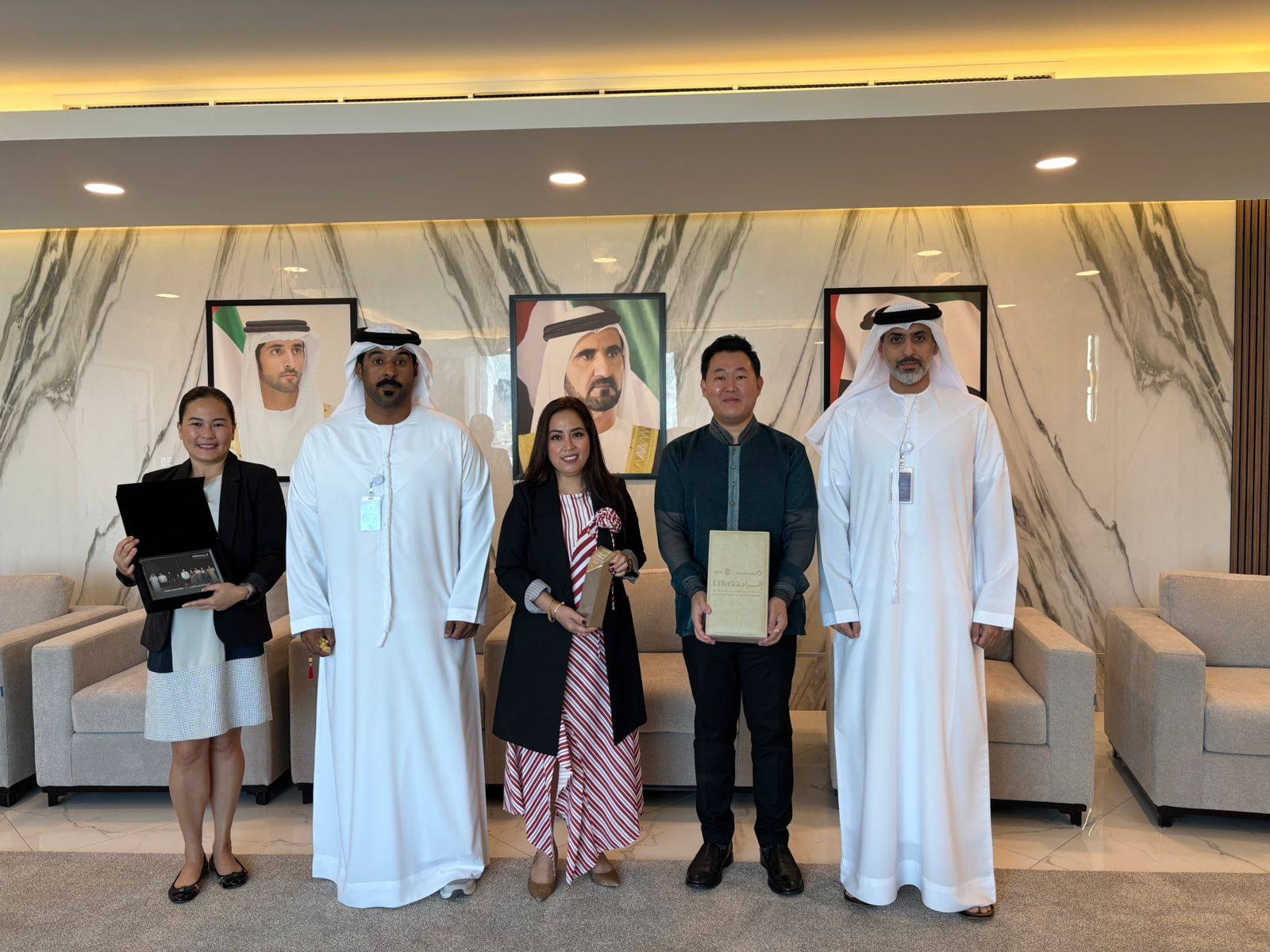 Filipino Social Club receives Platinum Award, AED75K from CDA