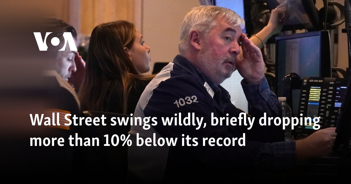 Wall Street swings wildly, briefly dropping more than 10% below its record