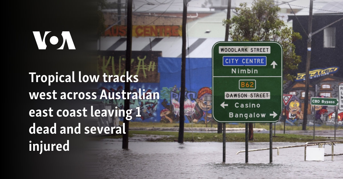 Tropical low tracks west across Australian east coast leaving 1 dead and several injured