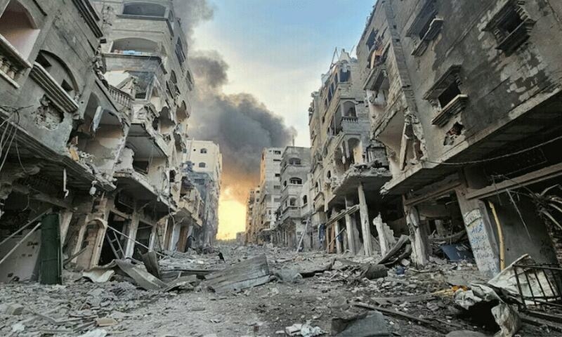 Israeli strikes on school housing displaced and on market kill 48 in Gaza