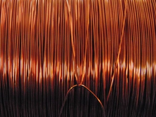 Copper slips as dollar firms ahead of US-China talks