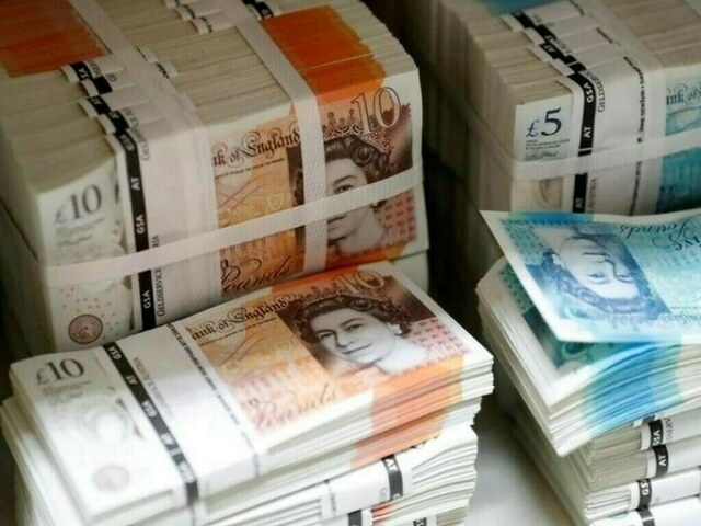 Pound higher against dollar