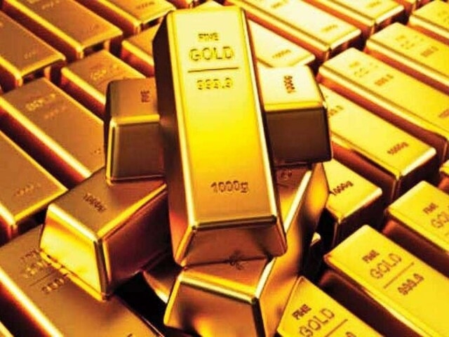 Gold falls from near four-week peak on firm dollar