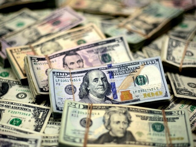 Dollar rises against major peers