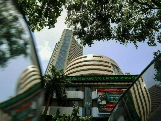 Indian benchmarks close marginally higher