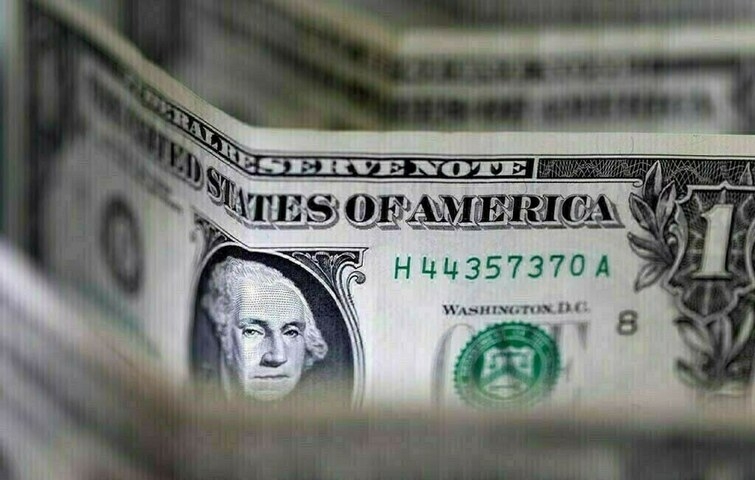 Dollar holds steady