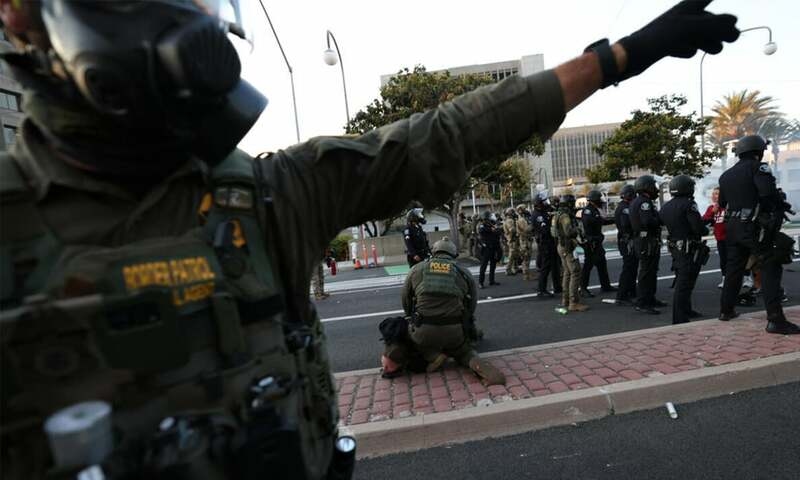 US officials defend immigration raid tactics