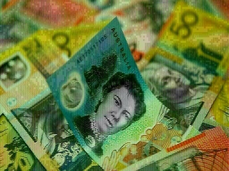 Australian dollar holds steady ahead of expected rate cut, kiwi flat