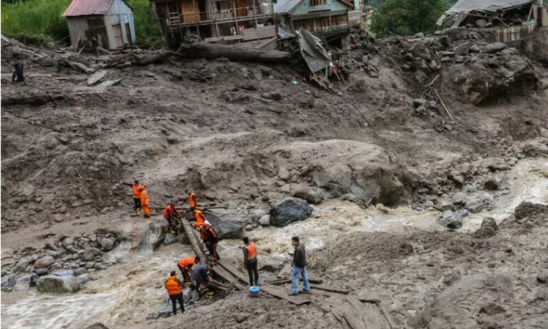 Indian rescuers scour debris after 60 killed in flood