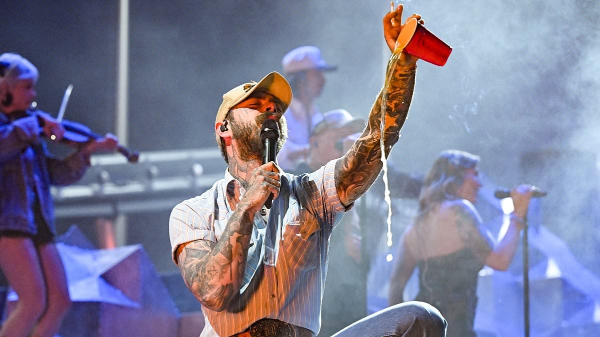 Post Malone brings out surprise superstar singer to join him during the second weekend of Coachella as they share a drink onstage