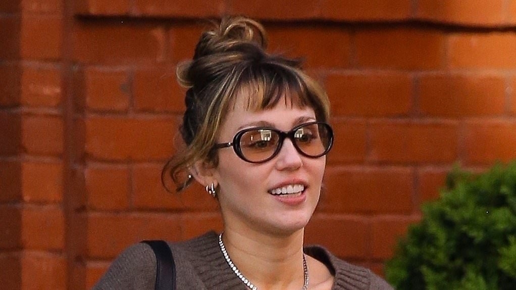 Miley Cyrus beams after shock news her father Billy Ray is dating Elizabeth Hurley