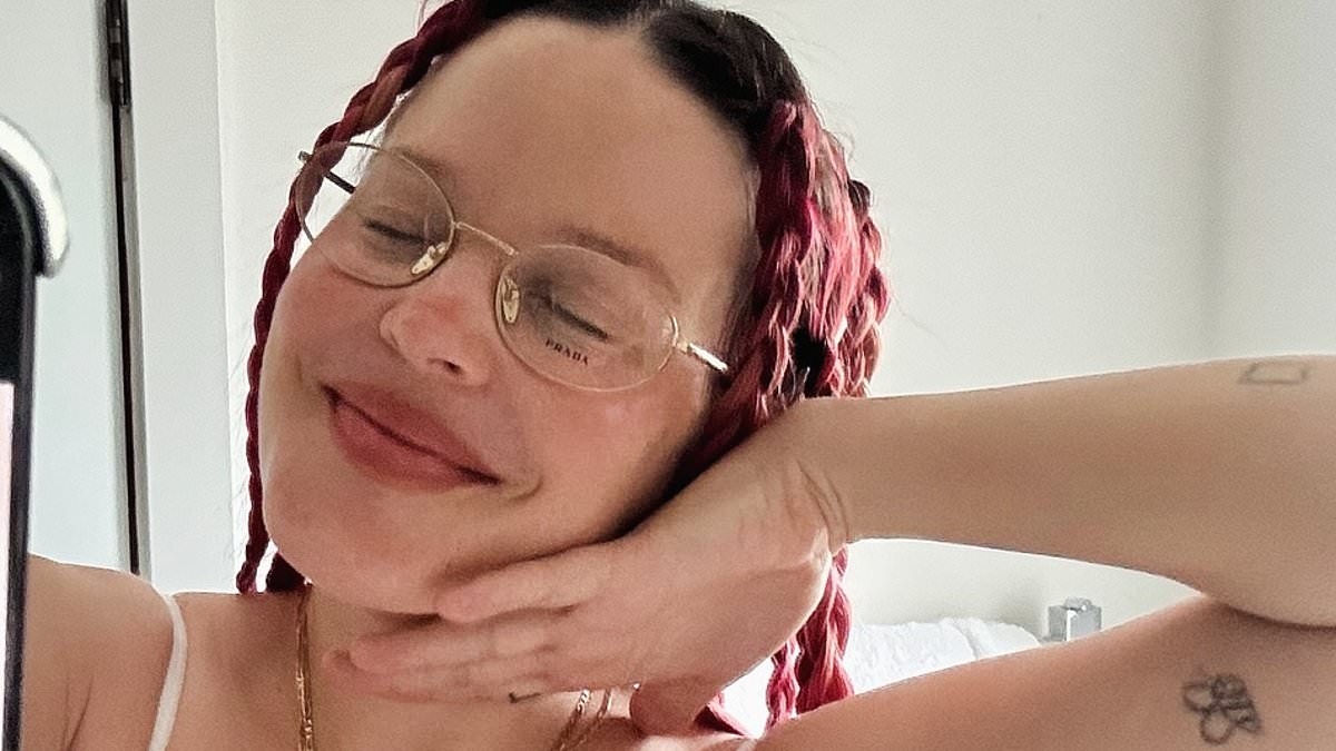 Pregnant Anne-Marie shows off her baby bump in a white bra and pyjama bottoms as she prepares to welcome second child with husband Slowthai
