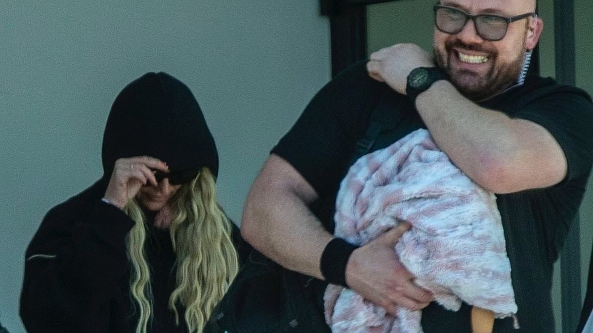 EXCLUSIVE Britney's holiday with a creepily lifelike plastic doll, the heavily tattooed boyfriend left at home and why the friends who fought for her freedom are worried all over again: CAROLINE GRAHAM