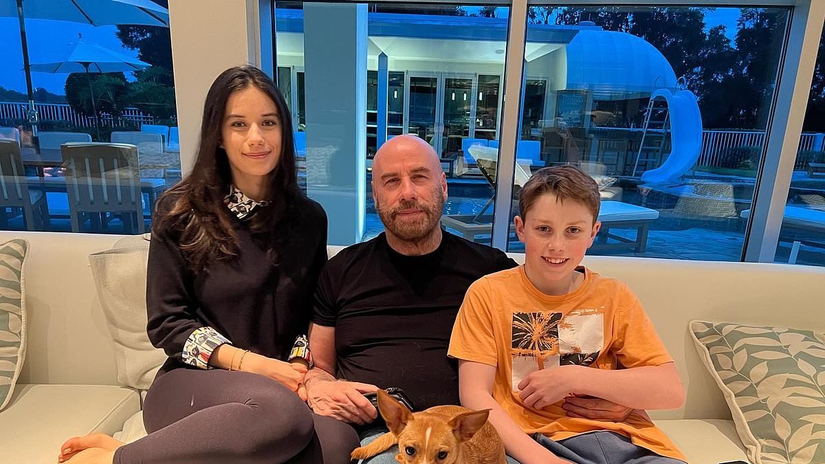 John Travolta reassures fans after candid bedroom snap of dog Peanut in $10M Florida home sparks concern