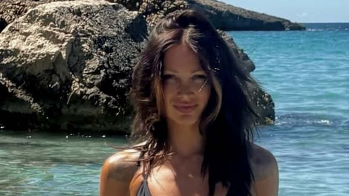 Bikini-clad Lou Teasdale cosies up to boyfriend Andy Carroll during romantic getaway after it was revealed the married footballer 'plans to tie the knot' with his new lover