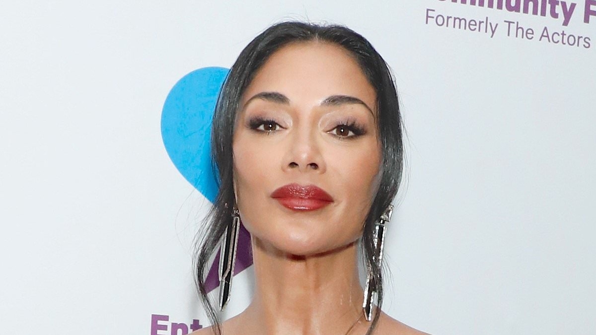 Nicole Scherzinger exudes elegance in a sparkly black satin corset gown as she attends Entertainment Community Fund gala in New York