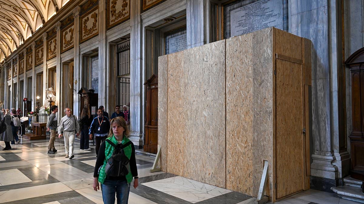 The Pope's final resting place: Chipboard barrier hides niche where Francis will be buried, four miles from the Vatican, in accordance with his wishes