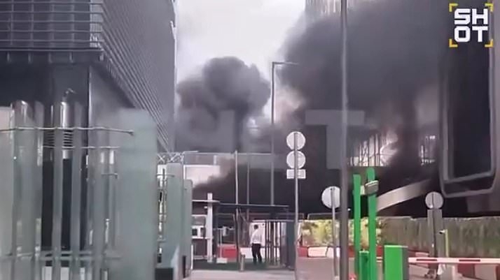 Three blasts rock Moscow business district as car explodes in shopping mall car park
