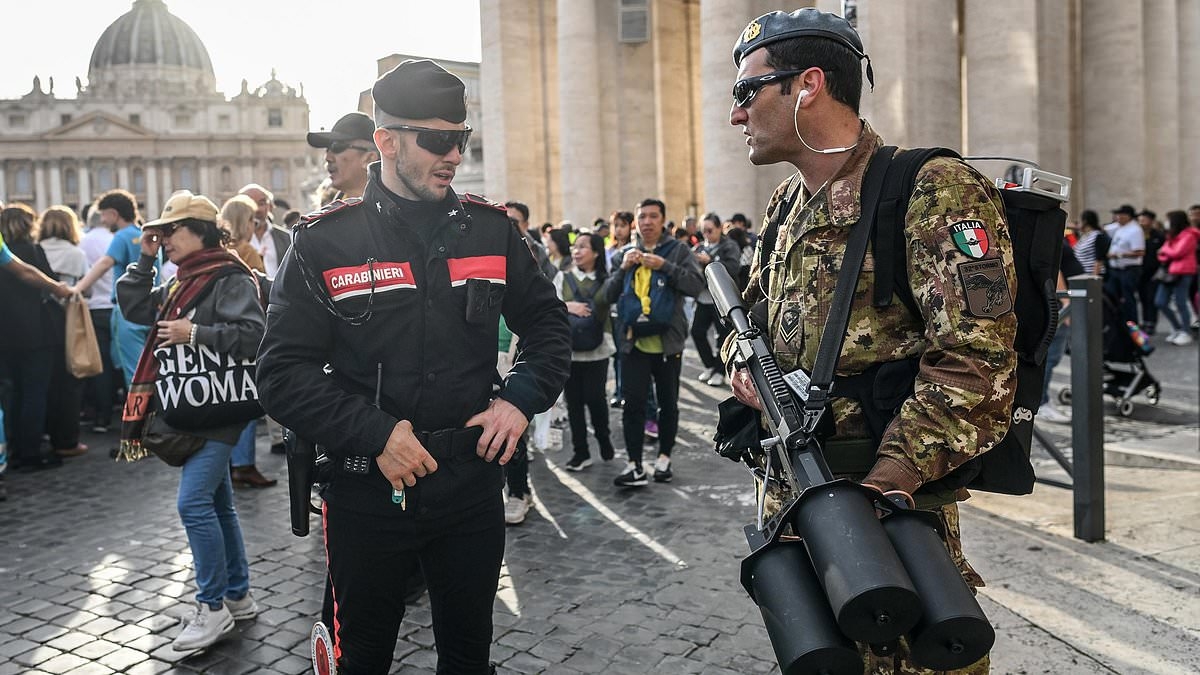 Ring of steel for Pope Francis' funeral with drone-busting troops part of huge security operation at the Vatican as the world's VIPs join 500,000 mourners