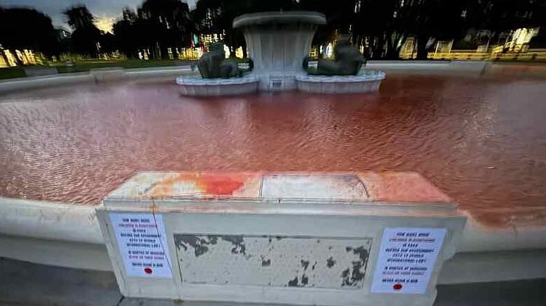 Outrage after fountain in Auckland is dyed red as part of Anzac Day protest