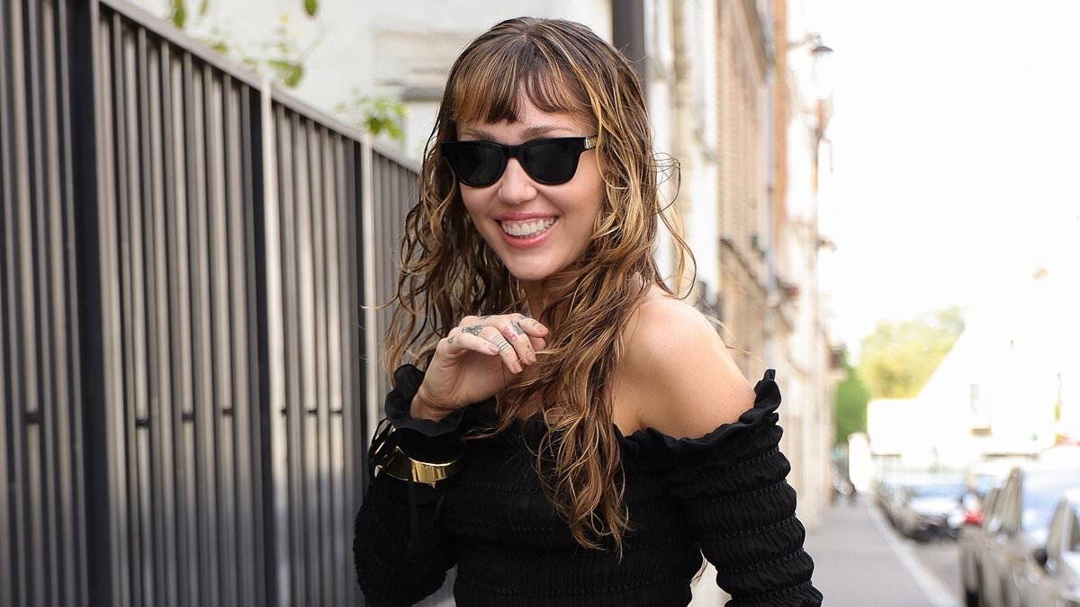 Miley Cyrus stuns in black minidress during Paris trip amid fears of Billy Ray's romance threatening comeback