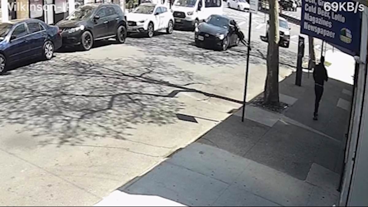 Man's brave attempt to stop carjacker costs him his LEG as horrifying video shows him clinging to stolen vehicle