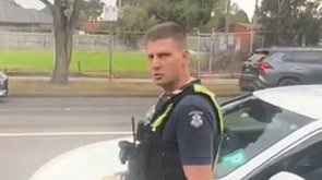 EXCLUSIVE Aussies divided after tense footage emerges of clash between no-nonsense cop and 'idiot' driver