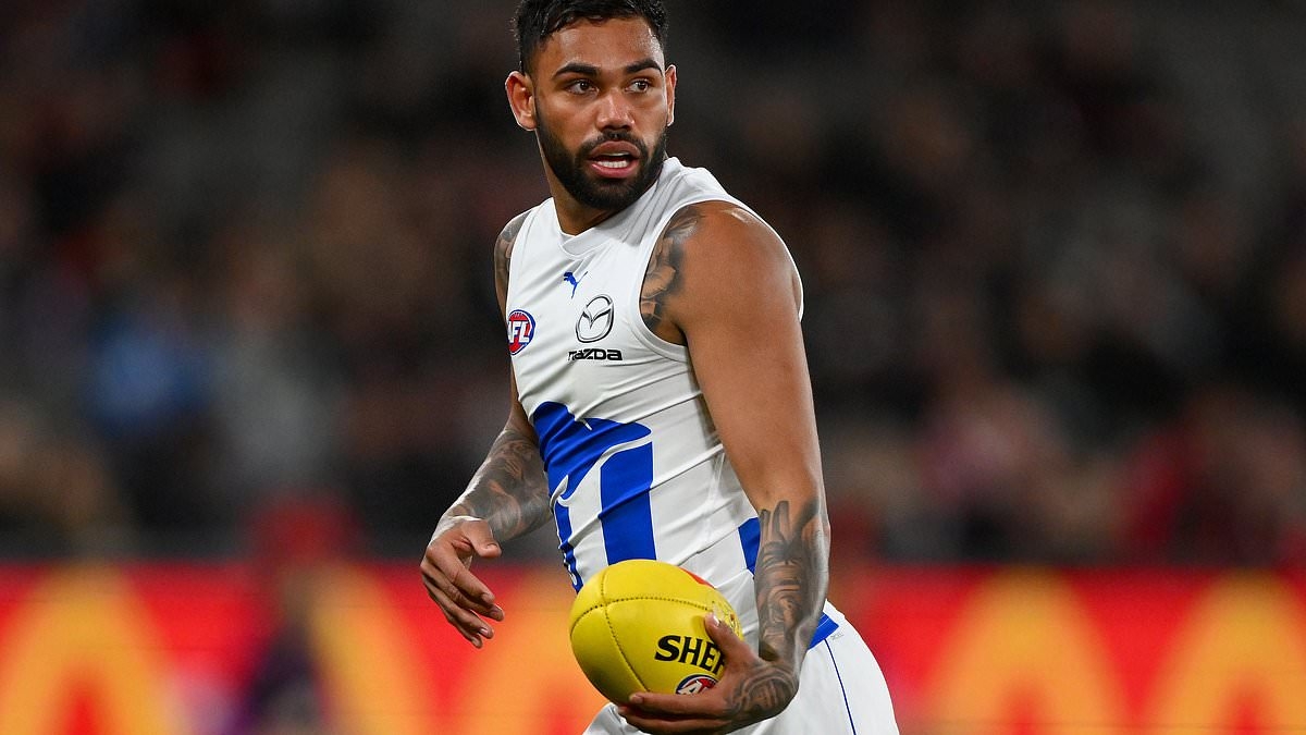 Troubled footy star Tarryn Thomas is allegedly held hostage at gunpoint after late-night meeting took a 'terrifying' turn'