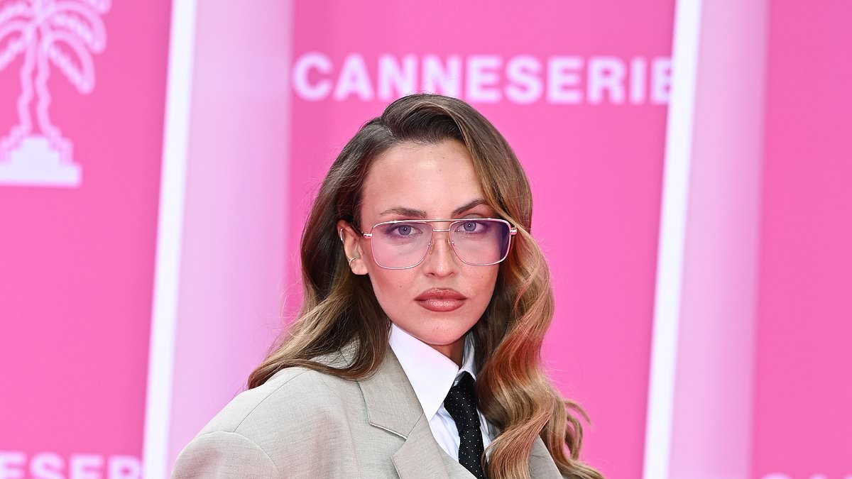 David Ginola's daughter Carla rocks a stylish three-piece suit with a shirt and tie as she steps out at Canneseries International Festival