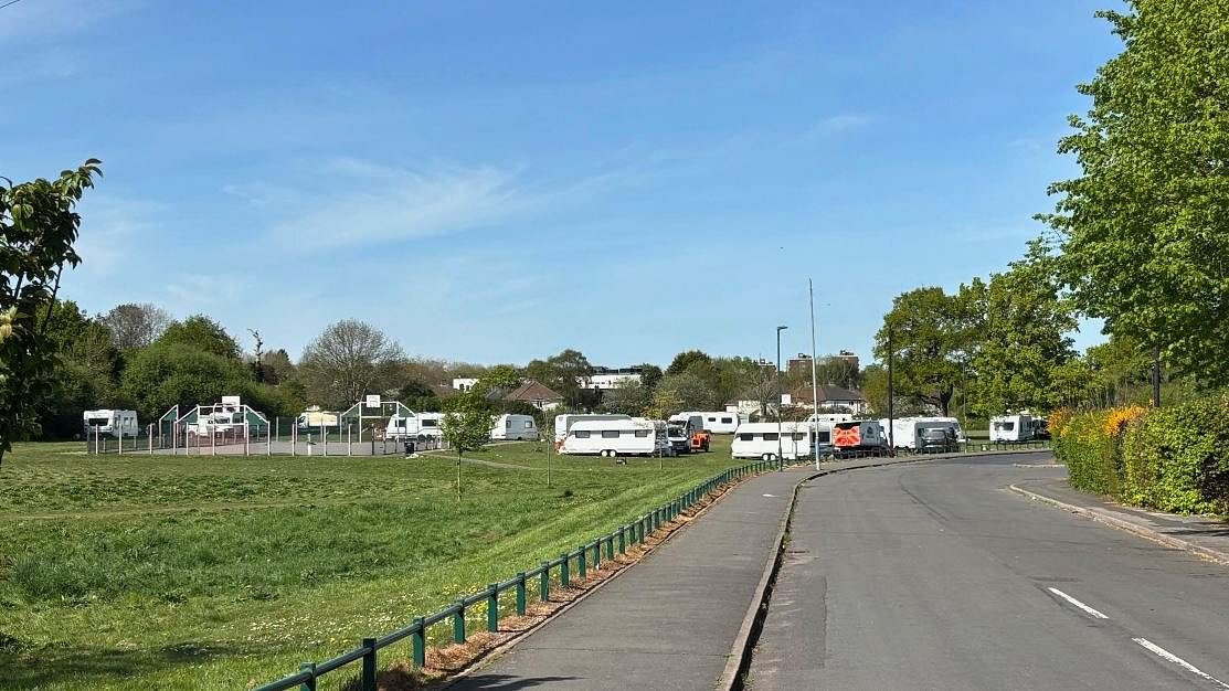 Travellers pitch up caravans in Birmingham parks near playground and school as council battle against illegal encampments continues