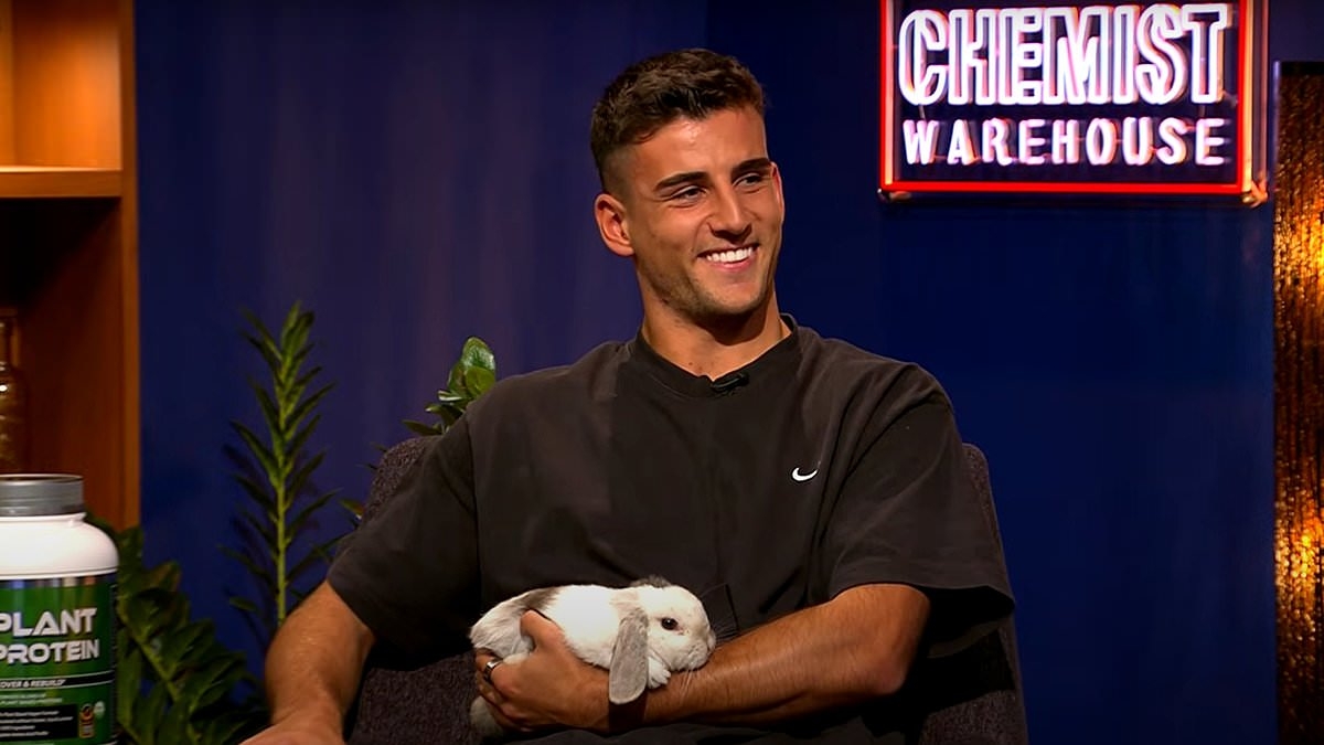 Nick Daicos jokes Jeremy Cameron was 'trying to injure' him by bizarrely handing the Magpies star a live rabbit during a TV show - as Geelong and Collingwood gear up for huge clash
