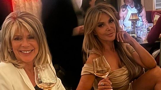 Lizzie Cundy looks glamorous in a gold dress as she enjoys boozy girls' night out with Ruth Langsford for her pre-birthday celebrations
